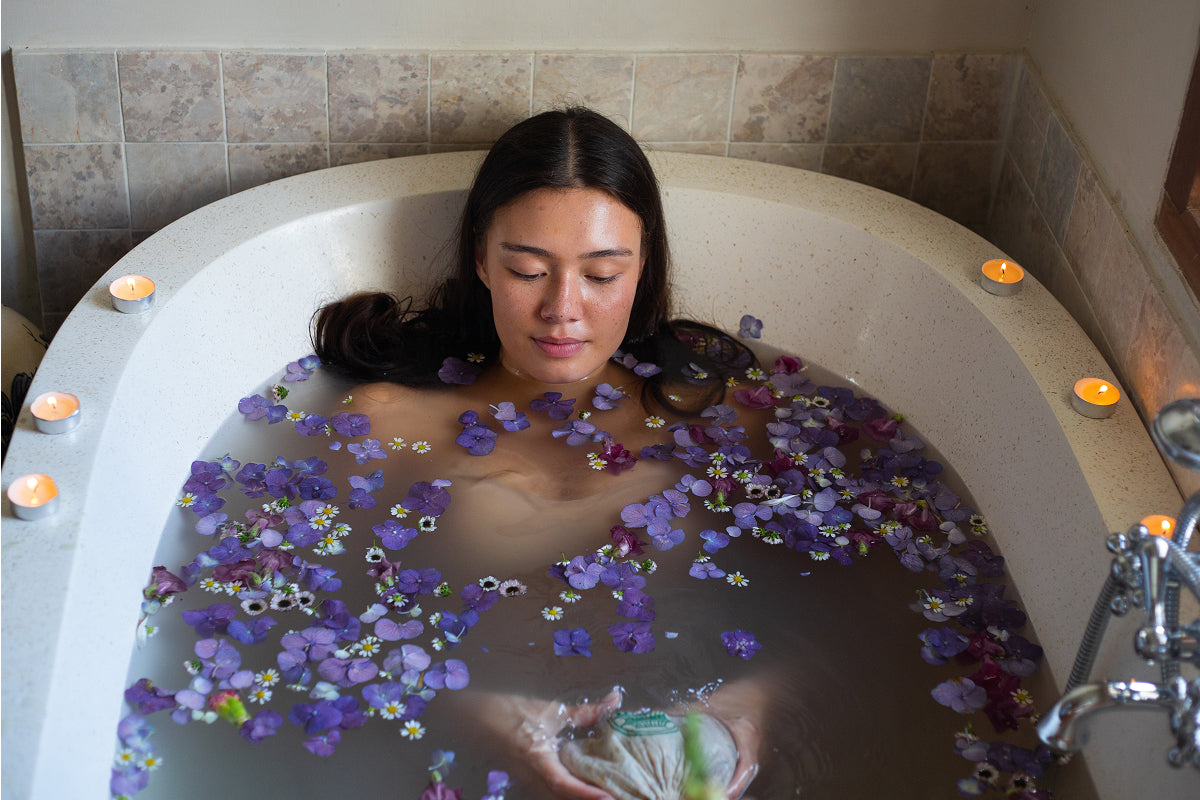 Woman Bathing in floural Tea Bath