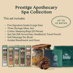 What's included in the Prestige Apothecary Spa Collection: five signature soaks, three glass jars, cotton steeping bags, spa set, massage dry brush, plus guided breathwork and music