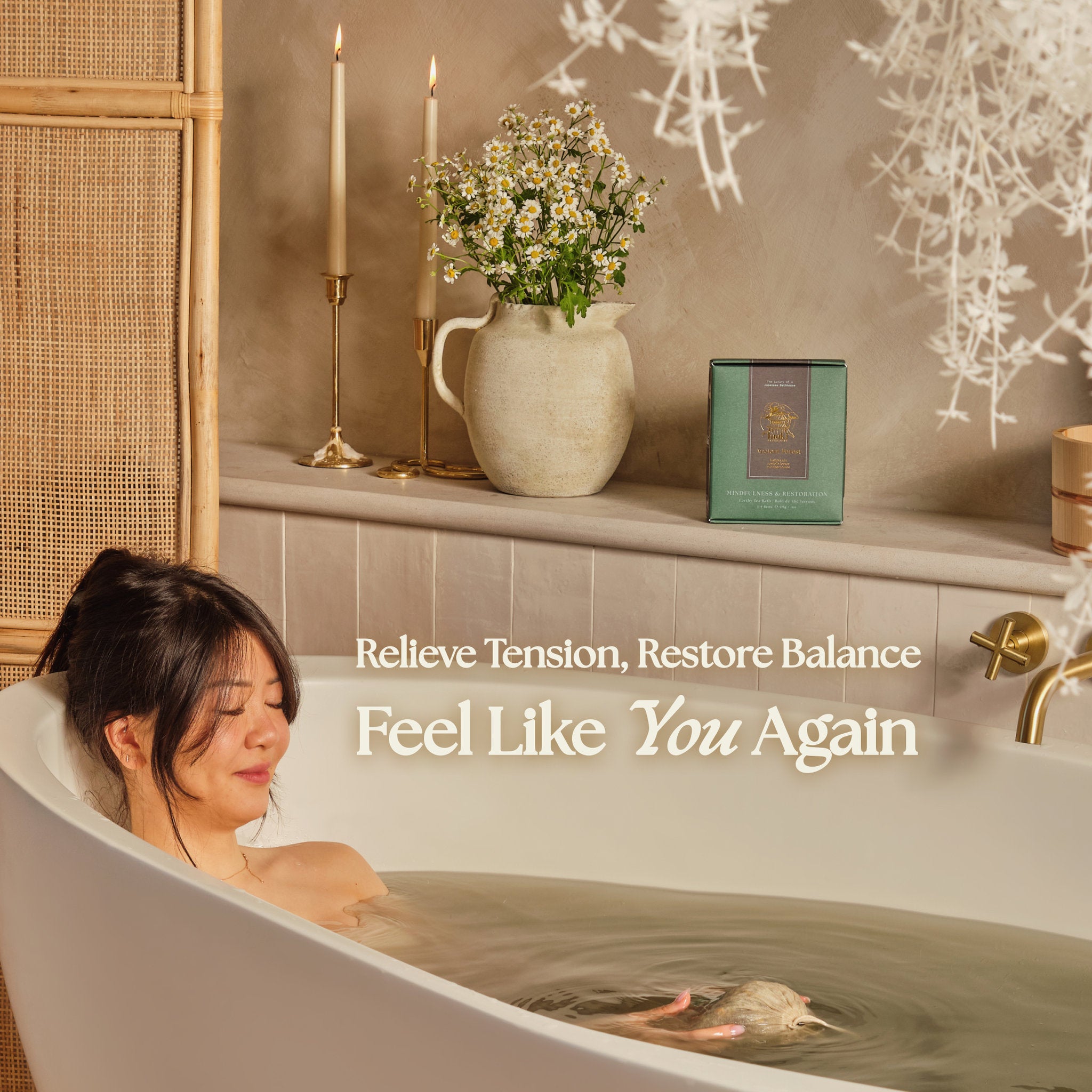 Woman relaxing in an Inoki tea bath - relieve tension, restore balance