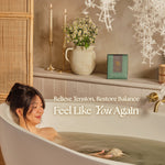 Woman relaxing in an Inoki tea bath - relieve tension, restore balance